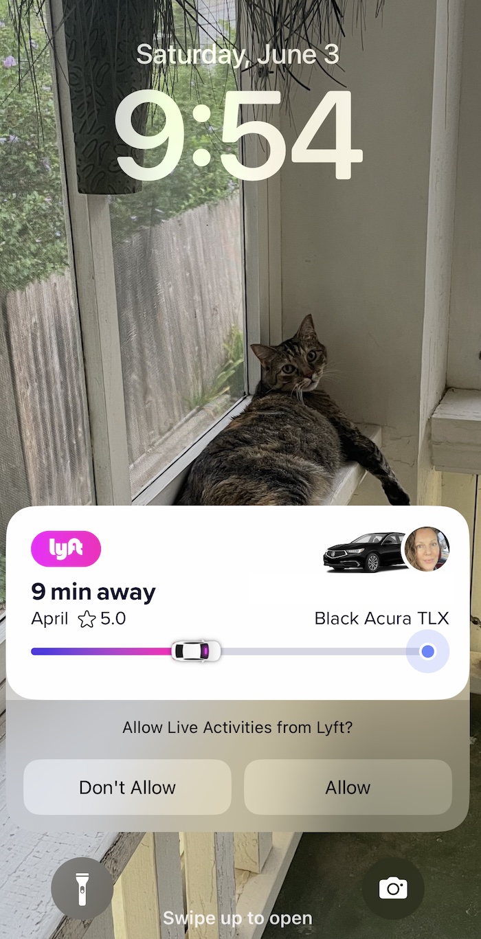 The Lyft app on an IOS device showed the status of the wait on the lock screen — users did not need to launch the Lyft app to track progress.